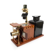 Large c. 1890s mahogany and brass "STROUD & RENDELL'S SCIENCE [MAGIC] LANTERN", with rack-and-pinion lens, unusual middle section with drop-down mirror for scientific observations, "Reynolds & Branson, Leeds" retailer's plate, tin rear section with blue g