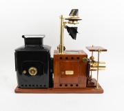 Large c. 1890s mahogany and brass "STROUD & RENDELL'S SCIENCE [MAGIC] LANTERN", with rack-and-pinion lens, unusual middle section with drop-down mirror for scientific observations, "Reynolds & Branson, Leeds" retailer's plate, tin rear section with blue g - 2