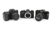 RICOH: Group of 1980s SLRs, comprising Ricoh KR-10 Super (Ricoh C 35-70mm f3.5-4.5, with cap), Ricoh KR-10 Super (body only), and Ricoh XR-M (Rikenon P Zoom 35-70mm f3.4-4.5, with cap). (3 items)