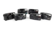 ASAHI KOGAKU: Group of c. 1990s plastic point-and-shoot cameras, comprising Pentax Zoom 70-R (2), Pentax Zoom 90, Pentax Zoom 90-WR, Pentax Zoom 105-R, and Pentax Zoom 105 Super. (6 items)