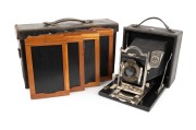 KODAK: "3A Premo No. 9" folding camera, c. 1910s, plate dimensions 14 x 8cm, Bausch & Lomb pneumatic shutter; offered in original matching leather case marked "Premo" on handle, with four slide holders.