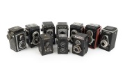 TLR CAMERAS: Mid-20th century group comprising Ciroflex, Hollywood Reflex, Mamiyaflex Junior, Traveller Reflex (2), Voigtl&auml;nder Brillant (2), WY Super Reflex, Zeiss Ikon Ikoflex, and one other. (10 items)