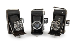 HOUGHTON: Group of c. 1940s folding cameras, comprising Selfix 820 (Ross Xpress 105mm f3.8/Epsilon) and two Rangers (Ensar 105mm f6.3/Trikon). (3 items)