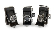HOUGHTON: Group of c. 1940s folding cameras, comprising Selfix 820 (Ross Xpress 105mm f3.8/Epsilon) and two Rangers (Ensar 105mm f6.3/Trikon). (3 items)