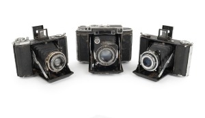 ZEISS IKON: Group of c. 1930s folding cameras, comprising Ikonta 521/16 (Novar 75mm f4.5/Klio), Nettar 515/16 (Novar 75mm f4.5/Pronto), and Super Ikonta 530/16 (Tessar 80mm f2.8/Compur Rapid). (3 items)