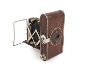 ZEISS IKON: Piccolette 545/12 "Luxus" folding camera, c. 1927, Tessar 75mm f4.5 lens, Compur shutter, brown leather covering. - 2