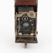 ZEISS IKON: Piccolette 545/12 "Luxus" folding camera, c. 1927, Tessar 75mm f4.5 lens, Compur shutter, brown leather covering. - 3