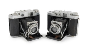 MAMIYA: Pair of c. 1940s Mamiya-Six folding cameras, both with Zuiko 75mm f3.5 lens, one with Seikosha-Rapid shutter, the other with Konan-Rapid shutter.