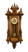 An antique German Vienna regulator style wall clock in walnut case with spring driven time and gong striking movement, circa 1910, ​​​​​​​98cm high.