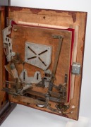 PENNY ARCADE: Wall-mounted trigger ball machine; hardwood case; key present, dimensions approx. 68 x 58 x 18cm. - 2