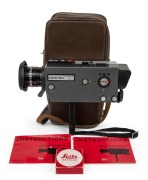 LEITZ: Leicina Super RT1 super-8 movie camera [#071678], c. 1970, with Vario 8-64mm f1.9 lens and hood; offered in leather case with boxed Leitz lens filter and instruction booklet.