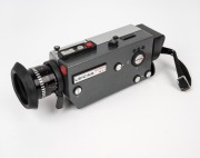 LEITZ: Leicina Super RT1 super-8 movie camera [#071678], c. 1970, with Vario 8-64mm f1.9 lens and hood; offered in leather case with boxed Leitz lens filter and instruction booklet. - 2