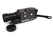 LEITZ: Leicina Special super-8 movie camera [#082668], c. 1972, with Optivaron 6-66mm f1.8 lens [#12555784] and cap; offered in Leitz leather case with maker's boxes for both camera and Optivaron lens, instruction booklets, and lens hood. - 2