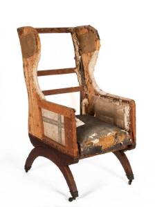 WINGBACK ARMCHAIR: Extremely rare early Colonial cedar armchair on unusual curved base on original castor. Tasmanian origin with King Billy pine & blue gum&nbsp;secondaries, c1820s. Timber frame restored ready for upholstering.