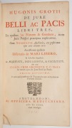 GROTIUS' DE JURE BELLI AC PACIS: 1712 leatherbound Amsterdam edition, gilt title to spine, 946pp. + index, front board detached. - 3