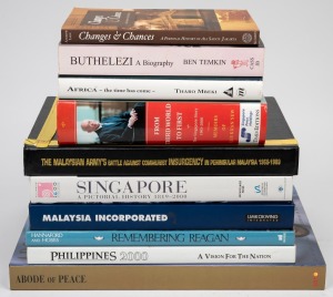 DIPLOMACY: A shelf of books presented to Alexander Downer during his time as Australian Minister for Foreign Affairs, all with signature and/or dedication by the foreign dignitary, including "Abode of Peace" (Sultan of Brunei), "Africa - The Time Has Come