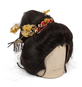 A vintage Japanese Geisha wig, early to mid 20th century, 30cm high.