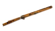 An antique Chinese tortoise shell and bone travelling chopstick set with tortoise shell handled knife, Qing Dynasty, 19th century, 29cm high overall.