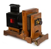 Enlarger/lantern projector, c. 1890s; iris diaphragm brass lens "J.H. Dallmeyer No. 4 Stigmatic Series II" [#57549]; dimensions approx. 50 x 34 x 70cm.