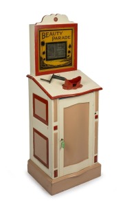 Free-standing coin-operated hardwood stereoscope, "Beauty Parade - Now Showing - The Seven Veils - One Penny", c. 1920s; handle and key present (lock jammed), operates manually with One Penny coin, overall height 1.45m.