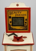 Free-standing coin-operated hardwood stereoscope, "Beauty Parade - Now Showing - The Seven Veils - One Penny", c. 1920s; handle and key present (lock jammed), operates manually with One Penny coin, overall height 1.45m. - 2