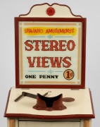 Free-standing coin-operated hardwood stereoscope, "Shajaho Amusements - Stereo Views - One Penny", c. 1920s; loaded with several stereo cards, handle and key present, operates manually with One Penny coin, overall height 1.45m. - 2