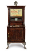 FORTUNE-TELLING MACHINE: "Ahren's London" palm reading machine, oak case, cast-iron claw feet, early-20th century, "Place your right hand firmly on the plate as illustrated - With your left, insert penny. Correct reading of your hand will then be delivere
