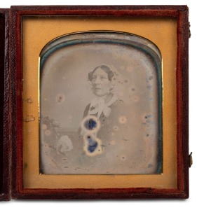 JOHN JABEZ EDWIN MAYALL (1813-1901) daguerreotype portrait of a woman, housed in original bi-fold leather case with gilt embossed details "MAYALL 224 REGENT ST., & 433 WEST STRAND, LONDON", mid 19th century, 10 x 9cm overall when closed.
