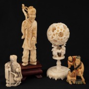 A Chinese carved ivory puzzle ball on stand, a Chinese carved ivory statue of a fisherman, together with two Japanese carved ivory netsuke, early to mid 20th century, (4 items), ​​​​​​​the largest 14cm high.