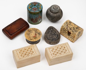 Carved bone cricket boxes, Indo-Persian hand-painted pill boxes, cloisonne box, pottery jar, tribal silver box, plus an antique English yew wood snuff box, 19th and 20th century, (8 items), the yew box 6cm wide.