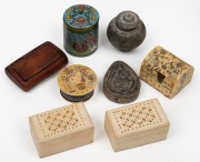 Carved bone cricket boxes, Indo-Persian hand-painted pill boxes, cloisonne box, pottery jar, tribal silver box, plus an antique English yew wood snuff box, 19th and 20th century, (8 items), ​​​​​​​the yew box 6cm wide.