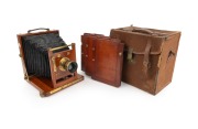GANDOLF: View camera, late 19th century, plate dimensions 11.6 x 16cm, uninscribed brass lens with iris diaphragm; offered in original case with three double-dark slides.