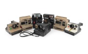 POLAROID: Group of 1980s instant cameras, comprising 1000 Onestep, 1500 Land Camera, Amigo 610 (2), Autofocus 660, Pronto!RF, and Sonar Onestep. (7 items)