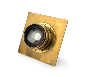 TAYLOR, TAYLOR & HOBSON: Early-20th century large format Series V Cooke Process brass lens [#19777], "20 x 16 inches - eq. focus 25.2 inches", iris diaphragm, focal length approx. 90mm, on 20.5 x 20cm brass lens board; "Sold by Penrose & Co. London".