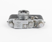 LEITZ: Leica IIIg rangefinder camera [#971819], c. 1956, with Elmar 50mm f2.8 lens [#1450283]. - 4