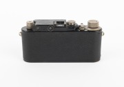 LEITZ: Black-body Leica III (Mod. F) rangefinder camera [#121531], c. 1933, with Elmar 50mm f3.5 lens, Leica lens cap, and Leica leather case. - 3