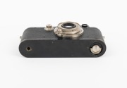 LEITZ: Black-body Leica III (Mod. F) rangefinder camera [#121531], c. 1933, with Elmar 50mm f3.5 lens, Leica lens cap, and Leica leather case. - 4
