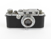 LEITZ: Leica III (Mod. F) rangefinder camera [#306924], c. 1933, with Hektor 50mm f2.5 lens, Leica lens cap, and Leica leather case. - 2