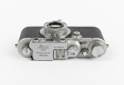 LEITZ: Leica III (Mod. F) rangefinder camera [#306924], c. 1933, with Hektor 50mm f2.5 lens, Leica lens cap, and Leica leather case. - 4