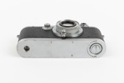 LEITZ: Leica III (Mod. F) rangefinder camera [#306924], c. 1933, with Hektor 50mm f2.5 lens, Leica lens cap, and Leica leather case. - 5
