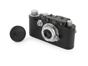 LEITZ: Black-body Leica III (Mod. F) rangefinder camera [#97079], c. 1933, with Elmar 50mm f3.5 lens and Leica lens cap.