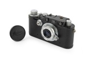 LEITZ: Black-body Leica III (Mod. F) rangefinder camera [#97079], c. 1933, with Elmar 50mm f3.5 lens and Leica lens cap.