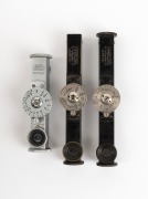 LEITZ: Group of rangefinder attachments, comprising FODIS (black/nickel; feet scale; in leather case), FODIS (black/nickel; meter scale), and FOKOS (chrome). (3 items) - 2