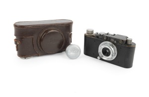 LEITZ: Black-body/chrome fittings Leica II (Mod. D) rangefinder camera [#78479], c. 1932, with Hektor 28mm f6.3 lens, Leica lens cap, and Leica leather case.