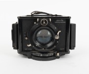 JOS-PE: Tri-Colour Camera [#607], c. 1925, with Quinar 105mm f2.5 lens [#168132]; offered in leather case with five film holders and two filters; scarce and unusual camera configuration designed to produce instant simultaneous red/green/blue negatives. - 2