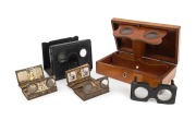 POCKET STEREOSCOPES: Group of five different models, including two c. 1908 Rotary Photographic Co. "Pocket Rotoscopes", both of which are loaded with many miniature stereo cards.