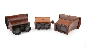 HANDHELD STEREOSCOPES: Group of three c. 1890s polished timber stereoscopes, including two Brewster-types.
