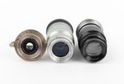 LEITZ: Group of lenses, all with Leica caps, comprising EKURZ Elmar 35mm f3.5 (in maker's box), ELANG Elmar 90mm f4 [#220742] (black/chrome; in maker's box), and Elmar 90mm f4 [#1037211] (in plastic capsule). (3 items) - 2