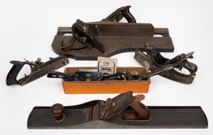 Five assorted vintage and antique planes, including a STANLEY No.52 chute board, 19th/20th century, the largest 55cm long.