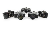 MINOLTA: Group of 1970s-80s SLRs, comprising Minolta 7000 (body only), Minolta Dynax 7000i (body only), Minolta SRT Super (MC Rokkor-PG 58mm f1.2), Minolta X-500 (MD Rokkor 50mm f1.7), and Minolta XG-1 (body only). (5 items)
